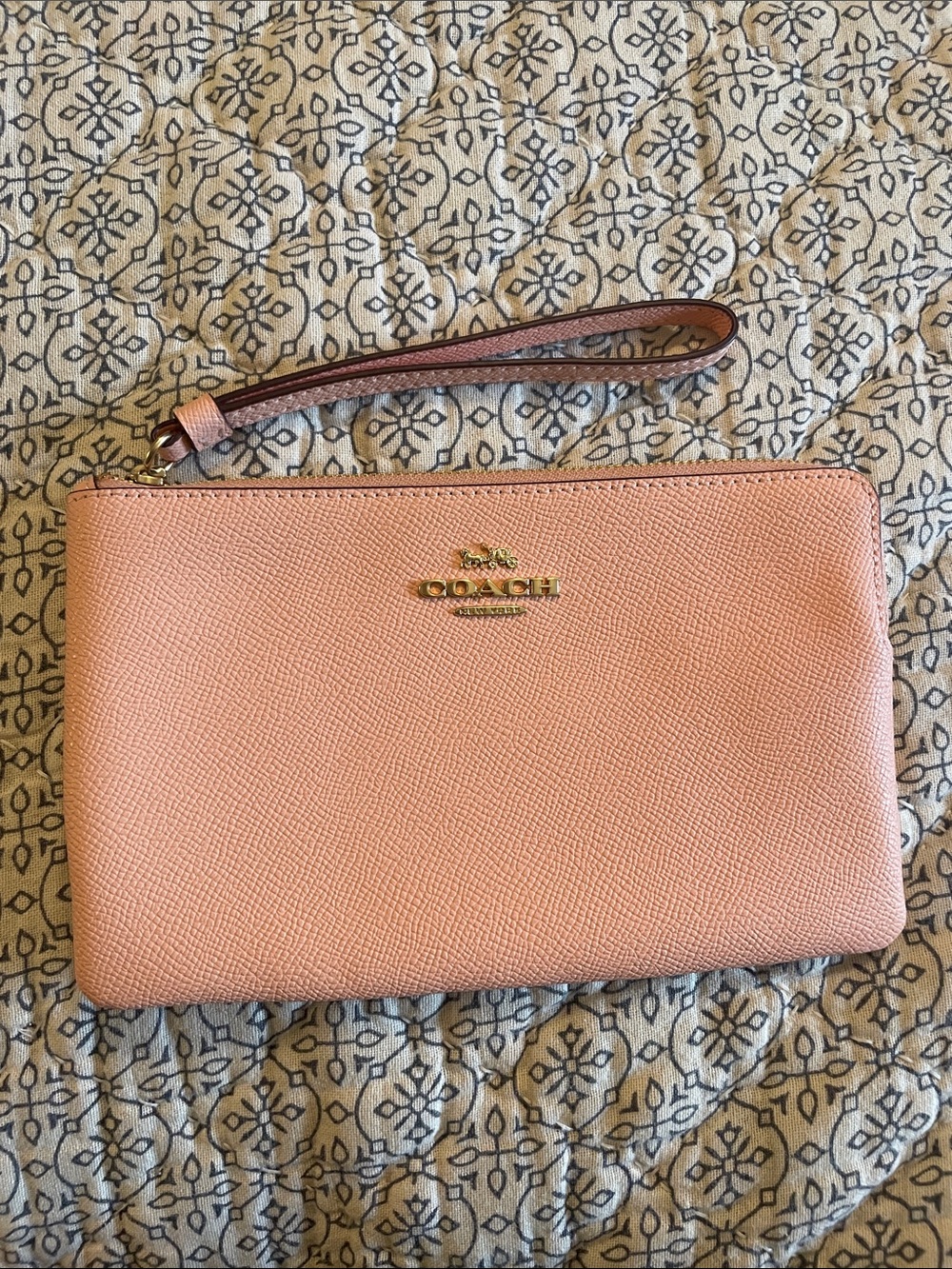 Coach Pebbled Leather Wristlet in peach with Gold Hardware